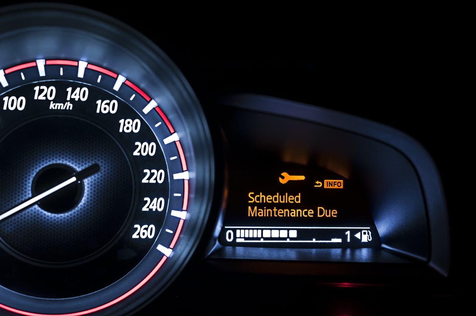 Warning: Your car needs scheduled maintenance. Contact Bolt Auto Care in Gainesville, TX.